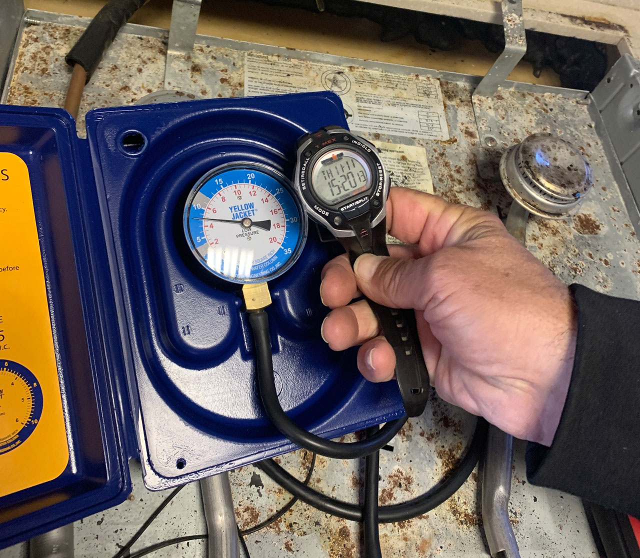 RV Inspector using Gas Leak Detector 